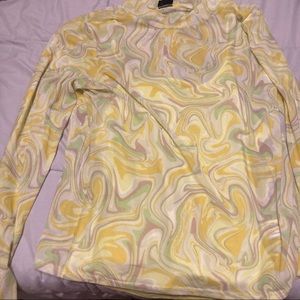 See through grovey shirt with green shirt underneath